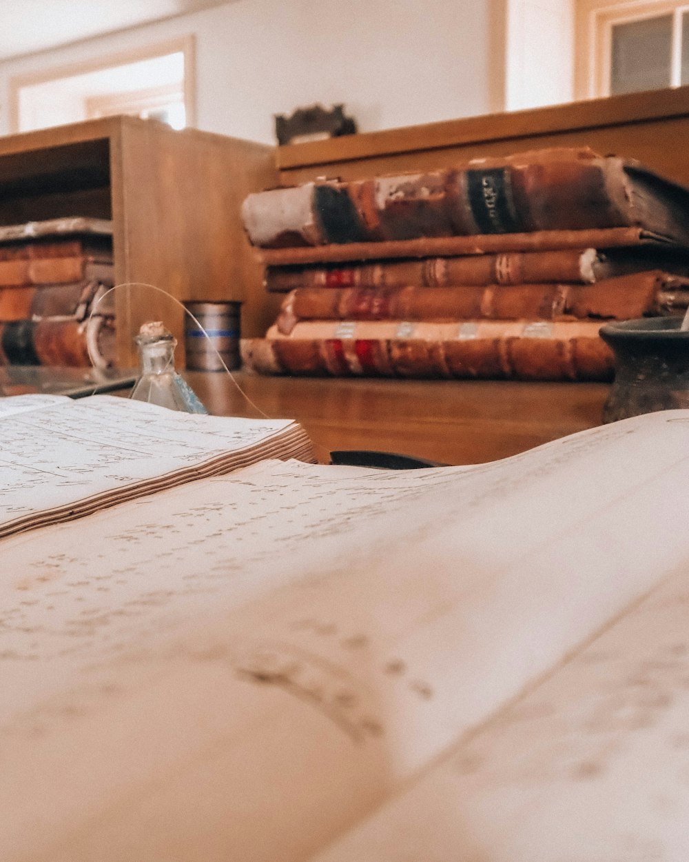 Open law book on a lawyer's desk — the chamber's daily craft